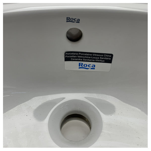 Овальний керамічний умивальник De Roca 276657 NEO - міцна та вологостійка раковина морського класу для компактних приміщень